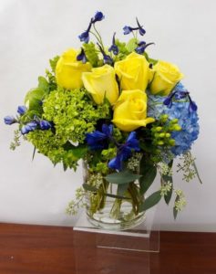 Somewhere between an English garden and the wildflowers of a meadow lies Garden Meadow, even mother nature is impressed by this midsummer combination of cool colors and fanciful feel. With any array of roses, hydrangea, other seasonal mixes. Approx 11" to 14" tall