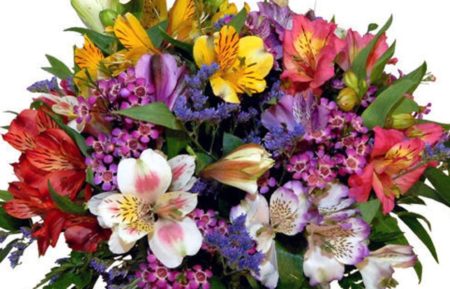 Beautiful alstroemeria accented with Australian waxflower and playful butterflies.